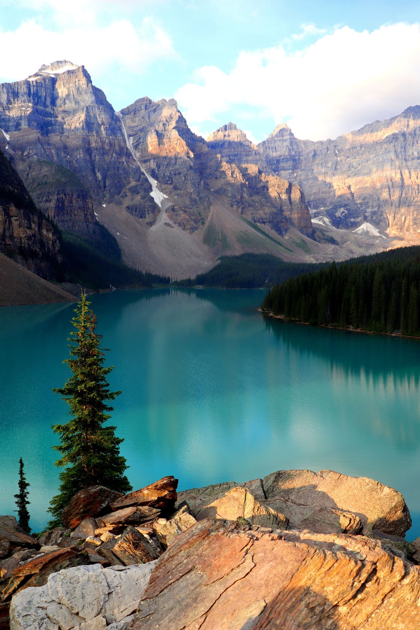 Turquoise waters of Moraine Lake ringed by mountains in Banff National Park