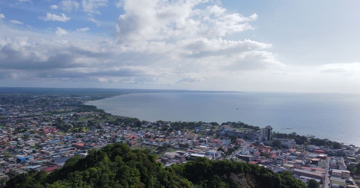 Aerial view of a coastal city in Guyana
