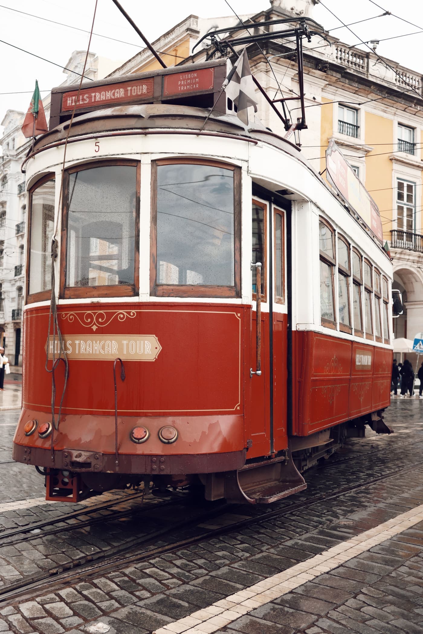 Historic tram passing through central Lisbon