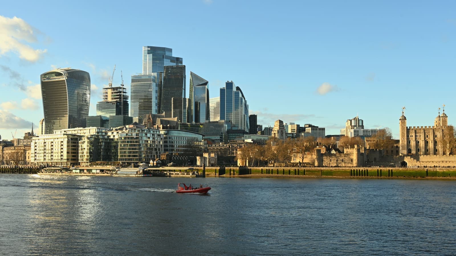 Panorama of the London skyline and Tower of London from across the River Thames