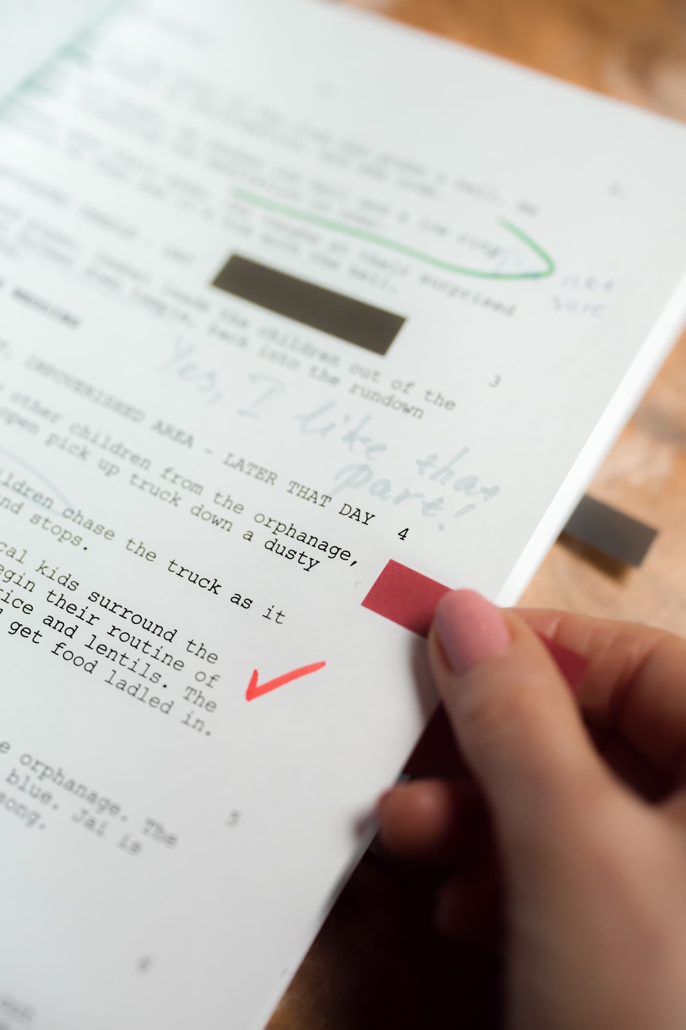 Typed manuscript page marked up with handwritten corrections