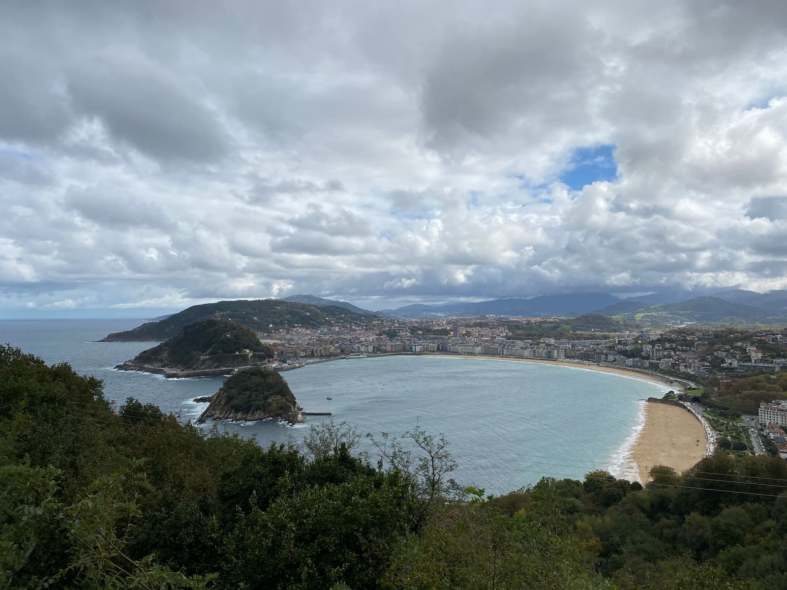 Panorama of La Concha Bay and the coastal cityscape of San Sebastian, Spain