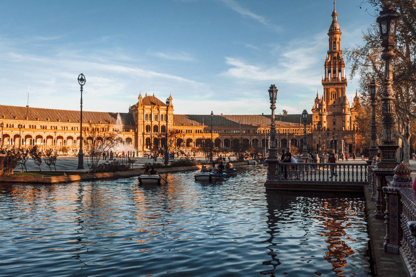 Plaza de Espana in Seville reflected in its canal at sunset