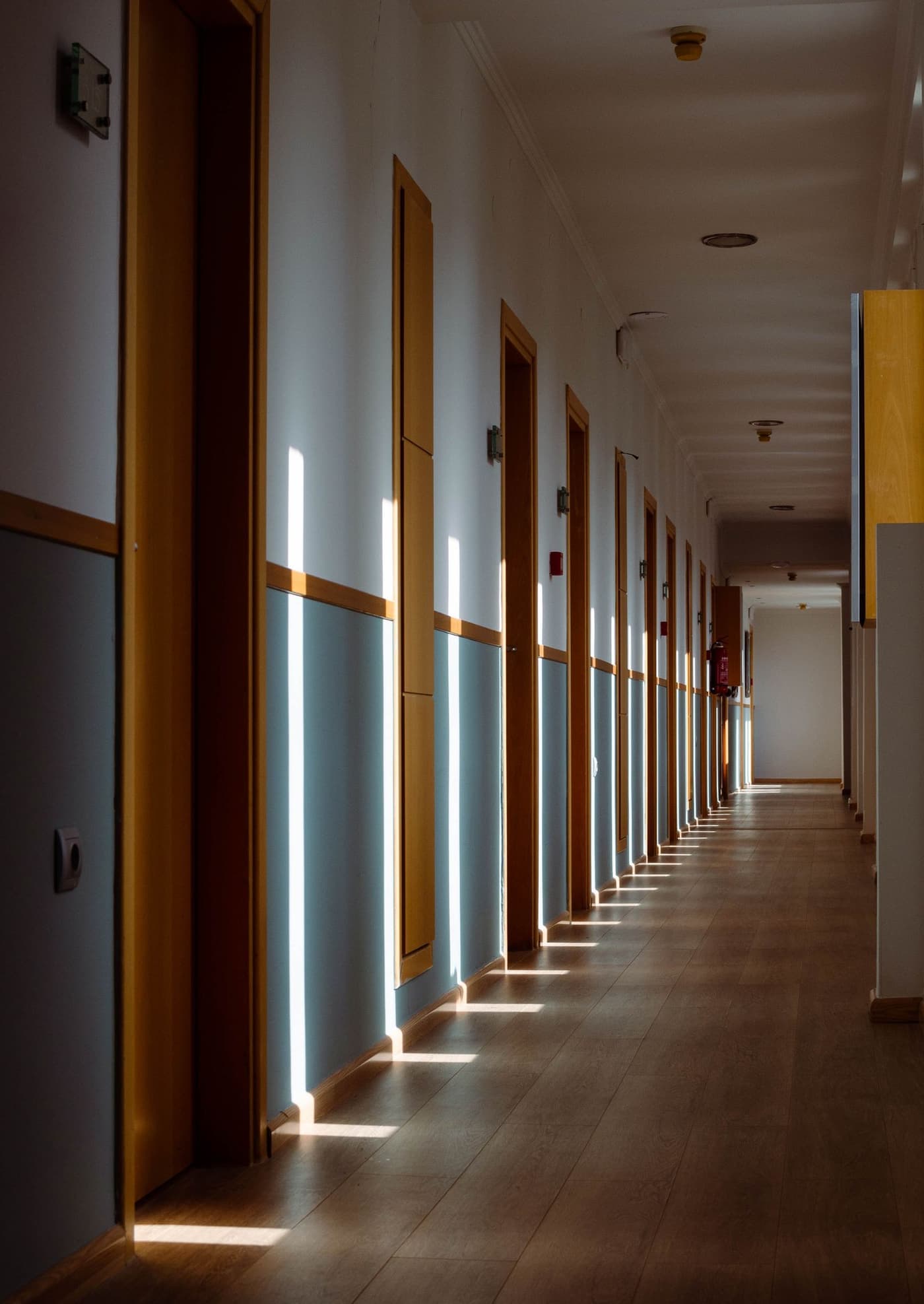 Light falling across the hallway of a family home.
