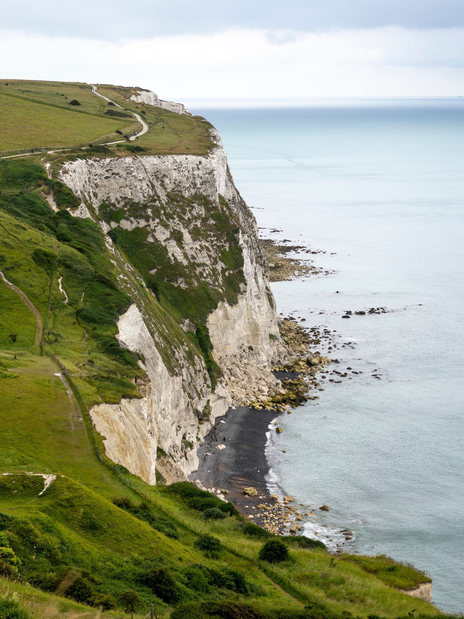 White Cliffs of Dover overlooking the English Channel on a cloudy day